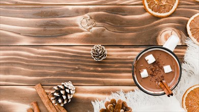 Hot chocolate with marshmallow wooden background