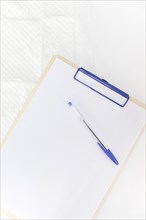Pen white paper clipboard against white background