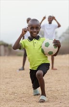 Portrait african child with football ball 2