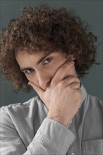 Portrait curly haired young man 9