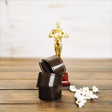 Rolled up film popcorn oscar statuette