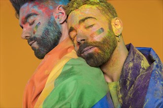 Soiled paint gay snuggling boyfriend
