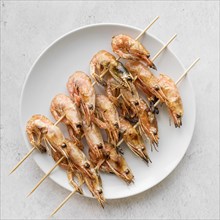 Top view plate with shrimp skewers