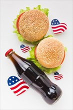 Top view soda bottle with burger american flags