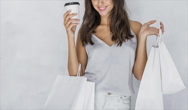 Woman undershirt with shopping bags coffee