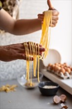 Chef holding freshly made pasta