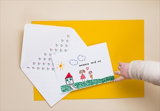 Child pointing finger drawing mother kid