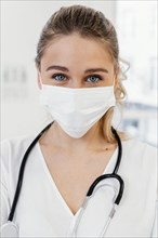 Close up doctor wearing mask