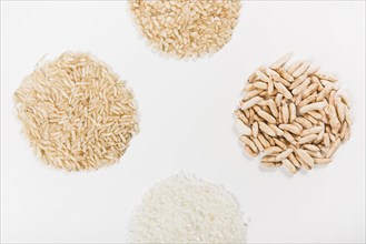Close up uncooked rice isolated white background