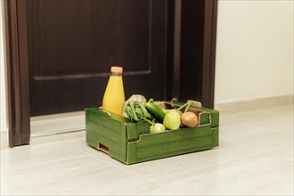 Crate food with juice bottle