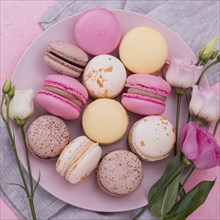 Flat lay macarons plate with roses