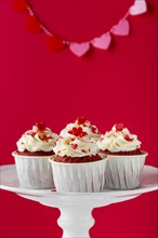 Front view cupcakes with heart shaped sprinkles