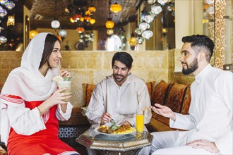 Group muslim friends restaurant