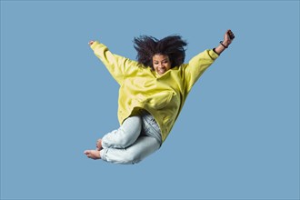 Happy young woman jumping 4