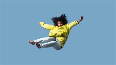 Happy young woman jumping 5