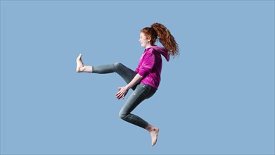 Happy young woman jumping 13