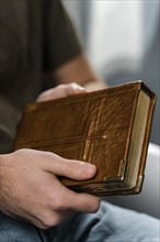 Man holding holy book