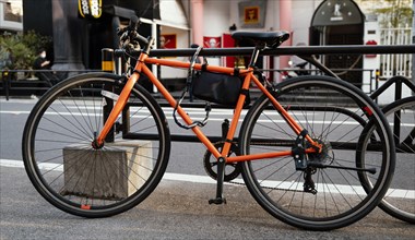 Orange bicycle outdoors