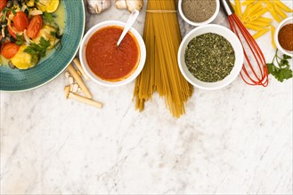 Pasta pasta ingredients marble textured backdrop