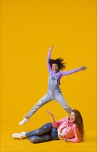 Portrait young women jumping 2
