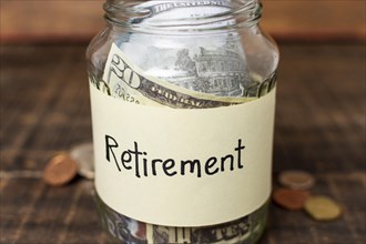 Retirement label jar filled with money