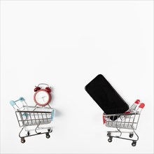 Shopping carts with phone alarm clock