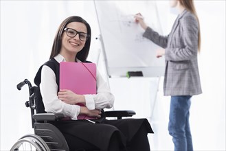 Smiley woman wheelchair