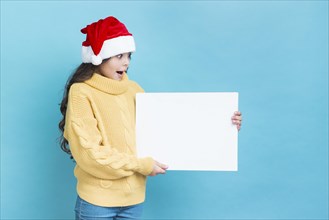 Surprised girl with poster mockup hands