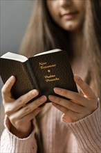 Woman reading from bible