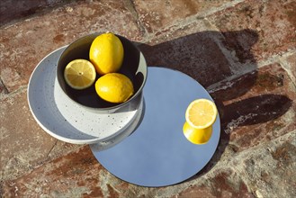 Bowl with fresh lemons 2