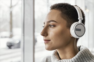 Close up woman with headphones