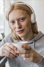 Close up woman with headphones 4