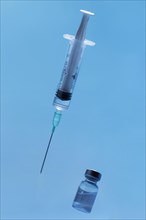 Front view syringe with vaccine close up