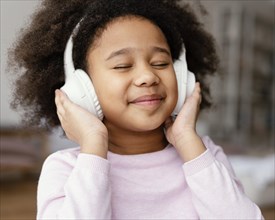 Little girl with headphones 2