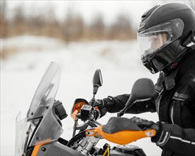 Man riding motorcycle winter day 2