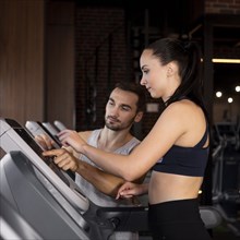 Medium shot woman treadmill