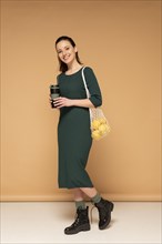 Woman casual clothes carrying reusable turtle bag 4