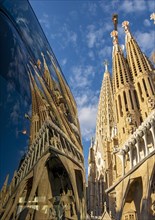 Sagrada Familia reflection in a car window