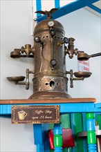 Historic espresso machine in a Paisa-style restaurant