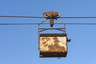 Bucket on the aerial tramway leading from the old coal mine at Longyearbyen