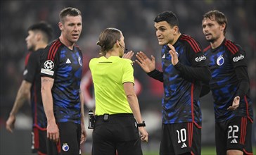 Referee Stephanie Frappart in discussion with Denis Vavro FC Copenhagen