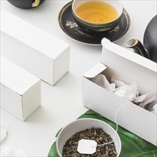 Tea bags white box with herbal tea white background