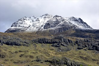 The mountain Slioch covered in snow in spring