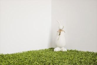 Hare with bow figurine grass