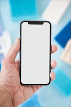 Smartphone template with cleaning products background