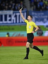 Referee Felix Zwayer shows yellow card yellow caution