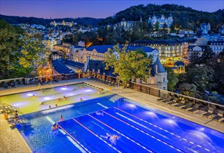 Outdoor terrace of the Terme thermal spa with panoramic view of the city at dusk
