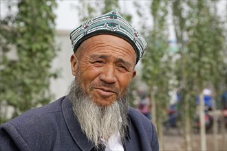 Portrait of man with beard of the Uighur tribe in Kashgar