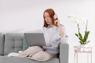 Woman working from home with laptop