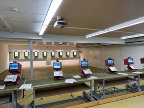 Modern Shooting Range with Target and Eletronic System in an Illuminated Underground Tunnel in Switzerland